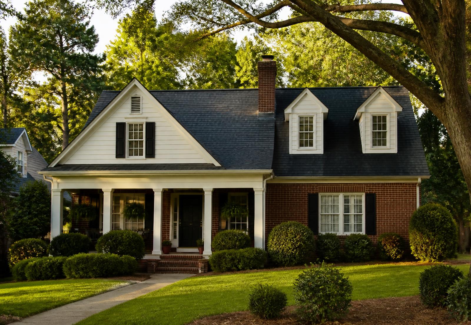 Brick and siding single-family home with a front porch on a tree-lined Augusta, Georgia street